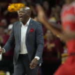 
              St. John's head coach Mike Anderson directs his team against Iowa State during the first half of an NCAA college basketball game, Sunday, Dec. 4, 2022, in Ames, Iowa. (AP Photo/ Matthew Putney)
            