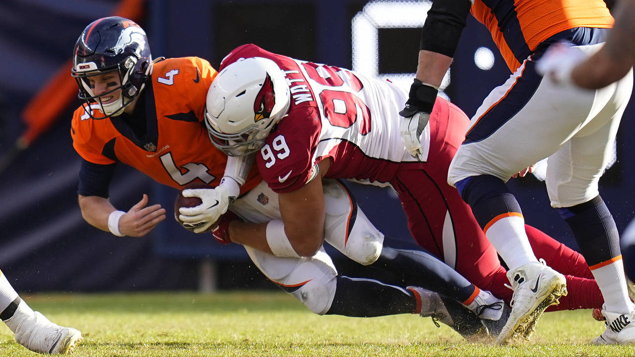Arizona Cardinals defensive end J.J. Watt (99) sacks Denver Broncos quarterback Brett Rypien (4) du...