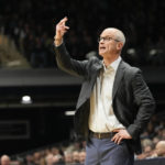 Connecticut head coach Dan Hurley calls to his players as his team plays against Butler in the first half of an NCAA college basketball game in Indianapolis, Saturday, Dec. 17, 2022. (AP Photo/AJ Mast)