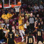 Minnesota guard Ta'Lon Cooper (55) scores a basket against Arkansas-Pine Bluff during the second half of an NCAA college basketball game on Wednesday, Dec. 14, 2022, in Minneapolis. Minnesota won 72-56.(AP Photo/Craig Lassig)