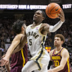 
              Purdue guard Brandon Newman (5) shoots during the second half of an NCAA college basketball game against Minnesota, Sunday, Dec. 4, 2022, in West Lafayette, Ind. (AP Photo/Doug McSchooler)
            