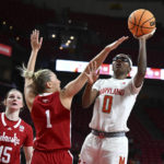 
              Maryland's Shyanne Sellers shoots as Nebraska's Jaz Shelley defends in the first half of an NCAA college basketball game, Sunday, Dec. 4, 2022, in College Park, Md. (AP Photo/Gail Burton)
            