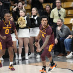 Arizona State guard Desmond Cambridge Jr., right, reacts after hitting a 3-point basket with seconds remaining in an NCAA college basketball game against Colorado, Thursday, Dec. 1, 2022, in Boulder, Colo. Arizona State guard DJ Horne, left, joins in the celebration. (AP Photo/David Zalubowski)