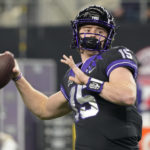 TCU quarterback Max Duggan (15) throws before the Big 12 Conference championship NCAA college football game against Kansas State for the Big 12 Conference championship in Arlington, Texas, Saturday, Dec. 3, 2022. (AP Photo/Mat Otero)