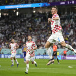 Croatia's Ivan Perisic celebrates after scoring his side's opening goal during the World Cup round of 16 soccer match between Japan and Croatia at the Al Janoub Stadium in Al Wakrah, Qatar, Monday, Dec. 5, 2022. (AP Photo/Thanassis Stavrakis)
