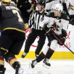Arizona Coyotes right wing Clayton Keller (9) skates with the puck during the first period of an NHL hockey game against the Vegas Golden Knights Wednesday, Dec. 21, 2022, in Las Vegas. (AP Photo/Chase Stevens)