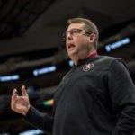 
              Stanford head coach Jerod Haase gestures to his team during the first half of an NCAA college basketball game against Texas, Sunday, Dec. 18, 2022, in Dallas. (AP Photo/Jeffrey McWhorter)
            