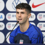 Christian Pulisic of the United States attends a press conference before a training session at Al-Gharafa SC Stadium, in Doha, Thursday, Dec. 1, 2022. (AP Photo/Ashley Landis)