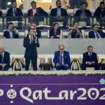 
              French President Emmanuel Macron applauds after the World Cup semifinal soccer match between France and Morocco at the Al Bayt Stadium in Al Khor, Qatar, Wednesday, Dec. 14, 2022. (AP Photo/Martin Meissner)
            