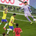 
              Brazil's Neymar, left, celebrates after scoring on a penalty kick against South Korea's goalkeeper Kim Seung-gyu (1) during the World Cup round of 16 soccer match between Brazil and South Korea, at the Education City Stadium in Al Rayyan, Qatar, Monday, Dec. 5, 2022. (AP Photo/Ariel Schalit)
            
