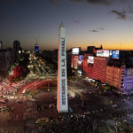 
              The Obelisk landmark is illuminated with a message that reads in Spanish: "We are in the final," in Buenos Aires, Argentina, Saturday, Dec. 17, 2022, during a rally in support of the national soccer team a day ahead of the World Cup final against France. (AP Photo/Rodrigo Abd)
            