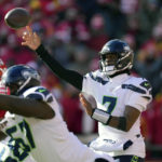 Seattle Seahawks quarterback Geno Smith throws during the first half of an NFL football game against the Kansas City Chiefs Saturday, Dec. 24, 2022, in Kansas City, Mo. (AP Photo/Charlie Riedel)