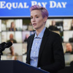 
              FILE - United States soccer women's national team member Megan Rapinoe speaks during an event to mark Equal Pay Day in the South Court Auditorium in the Eisenhower Executive Office Building on the White House Campus Wednesday, March 24, 2021, in Washington. The House has passed a bill that ensures equal compensation for U.S. women competing in international events, a piece of legislation that came out of the U.S. women's soccer team's long battle to be paid as much as the men. The Equal Pay for Team USA Act, passed late Wednesday night,  Dec. 21, 2022, now heads to President Joe Biden's desk. (AP Photo/Evan Vucci, File)
            