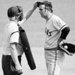 
              CORRECTS THAT PERRY WAS 84, NOT 88 AS ORIGINALLY SENT - FILE - Home plate umpire John Flaherty checks Cleveland Indians pitcher Gaylord Perry's cap for an illegal substance, at the request of Milwaukee Brewers manager Del Crandall, during the first game of a baseball doubleheader in Milwaukee, Sept. 3, 1973. Baseball Hall of Famer and two-time Cy Young winner Gaylord Perry, a master of the spitball, died Thursday, Dec. 1, 2022, at his home in Gaffney, S.C. He was 84. (AP Photo/File)
            