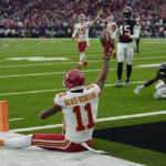 Kansas City Chiefs wide receiver Marquez Valdes-Scantling (11) celebrates his touchdown catch against the Houston Texans during the first half of an NFL football game Sunday, Dec. 18, 2022, in Houston. (AP Photo/David J. Phillip)