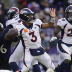 
              Denver Broncos quarterback Russell Wilson (3) looks to pass in the first half of an NFL football game against the Baltimore Ravens, Sunday, Dec. 4, 2022, in Baltimore. (AP Photo/Patrick Semansky)
            