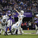 Indianapolis Colts quarterback Matt Ryan (2) throws a pass over Minnesota Vikings linebacker Jordan Hicks (58) during the first half of an NFL football game, Saturday, Dec. 17, 2022, in Minneapolis. (AP Photo/Andy Clayton-King)