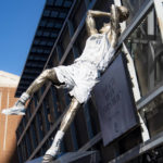 
              Dirk Nowitzki's statue is unveiled during the "All Four One" statue ceremony in front of the American Airlines Center in Dallas, Sunday, Dec. 25, 2022. (AP Photo/Emil T. Lippe)1
            