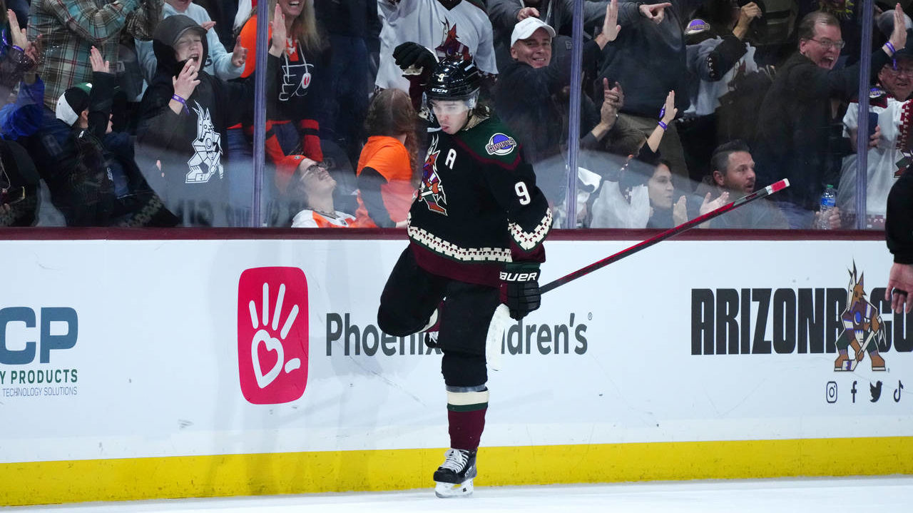 Arizona Coyotes right wing Clayton Keller celebrates after his winning goal against the Philadelphi...