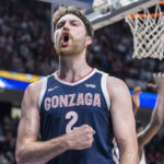 Gonzaga forward Drew Timme (2) reacts after scoring against Alabama during the second half of an NCAA college basketball game, Saturday, Dec. 17, 2022, in Birmingham, Ala. (AP Photo/Vasha Hunt)