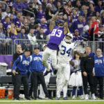 Indianapolis Colts cornerback Isaiah Rodgers (34) breaks up a pass intended for Minnesota Vikings wide receiver Jalen Nailor (83) on a fake punt during the first half of an NFL football game, Saturday, Dec. 17, 2022, in Minneapolis. (AP Photo/Andy Clayton-King)