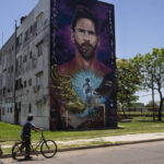 
              A mural of Lionel Messi a building near his former elementary school in Rosario, Argentina, Wednesday, Dec. 14, 2022. (AP Photo/Rodrigo Abd)
            