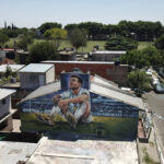 
              A mural of soccer player Lionel Messi covers the home where he lived in Rosario, Argentina, Wednesday, Dec. 14, 2022. (AP Photo/Rodrigo Abd)
            