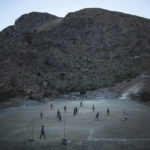 
              Amazigh boys play football underneath the High Atlas mountains, next to Ouarzazate, central Morocco, Monday Feb. 1, 2016.. (AP Photo/Mosa'ab Elshamy)
            