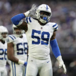 Indianapolis Colts defensive end Ifeadi Odenigbo (59) celebrates after a play during the first half of an NFL football game against the Minnesota Vikings, Saturday, Dec. 17, 2022, in Minneapolis. (AP Photo/Abbie Parr)