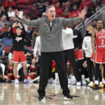 Western Kentucky head coach Rick Stansbury argues a call during the first half of an NCAA college basketball game against Louisville in Louisville, Ky., Wednesday, Dec. 14, 2022. (AP Photo/Timothy D. Easley)