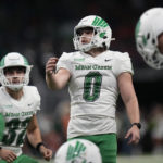 
              North Texas place-kicker Ethan Mooney (0) watches his field goal against UTSA during the first half of an NCAA college football game for the Conference USA championship in San Antonio, Friday, Dec. 2, 2022. (AP Photo/Eric Gay)
            