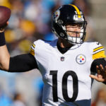 
              Pittsburgh Steelers quarterback Mitch Trubisky passes during the first half of an NFL football game between the Carolina Panthers and the Pittsburgh Steelers on Sunday, Dec. 18, 2022, in Charlotte, N.C. (AP Photo/Jacob Kupferman)
            