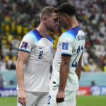 
              England's Jordan Henderson, left, celebrates with his teammate Jude Bellingham after scoring his side's first goal during the World Cup round of 16 soccer match between England and Senegal, at the Al Bayt Stadium in Al Khor, Qatar, Sunday, Dec. 4, 2022. (AP Photo/Hassan Ammar)
            