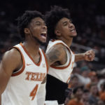 
              Texas guard Tyrese Hunter (4) and Texas forward Dillon Mitchell, right, celebrate a score during the second half of an NCAA college basketball game against Arkansas-Pine Bluff in Austin, Texas, Saturday, Dec. 10, 2022. (AP Photo/Eric Gay)
            
