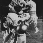 
              FILE - Boston College quarterback Doug Flutie rejoices in his brother Darren's arms after B.C. defeats the Miami Hurricanes with a last second touchdown pass in Miami on Nov. 23, 1984. Famous football plays often attain a legendary status with religious names like the "Immaculate Reception," the "Hail Mary" pass and the Holy Roller fumble. (AP Photo, File)
            