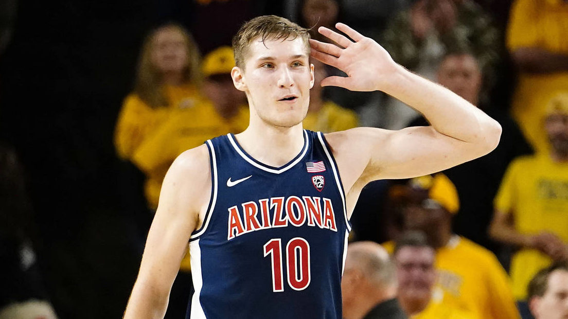 Arizona's Azuolas Tubelis (10) taunts fans after a win over Arizona State in an NCAA college basket...