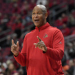 
              Louisville head coach Kenny Payne sends instructions in to his team during the first half of an NCAA college basketball game against Miami in Louisville, Ky., Sunday, Dec. 4, 2022. (AP Photo/Timothy D. Easley)
            