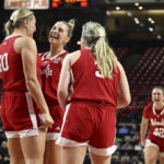 
              Nebraska's Jaz Shelley, center, reacts after scoring and drawing the foul against Maryland in the second half of an NCAA college basketball game, Sunday, Dec. 4, 2022, in College Park, Md. Nebraska won 90-67. (AP Photo/Gail Burton)
            
