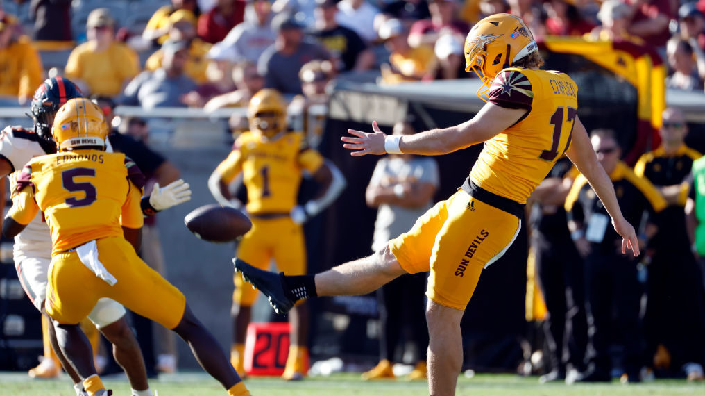 Eddie Czaplicki #17 of the Arizona State Sun Devils punts the ball during the second half against t...