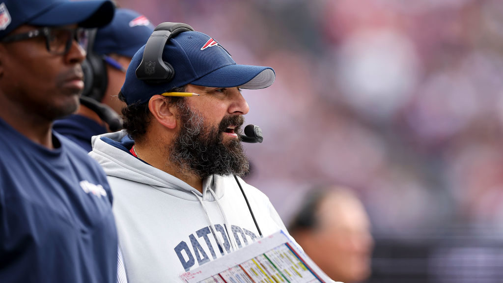 Offensive Line Coach Matt Patricia of the New England Patriots looks onward during during the secon...