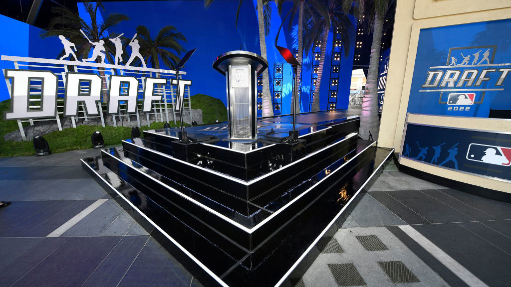 Workers prepare the stage for the 2022 MLB Draft at XBOX Plaza on July 17, 2022 in Los Angeles, Cal...