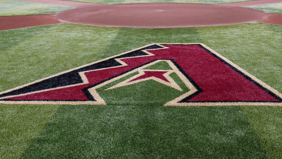 The Arizona Diamondbacks logo on the field during the MLB baseball game between the Chicago Cubs an...