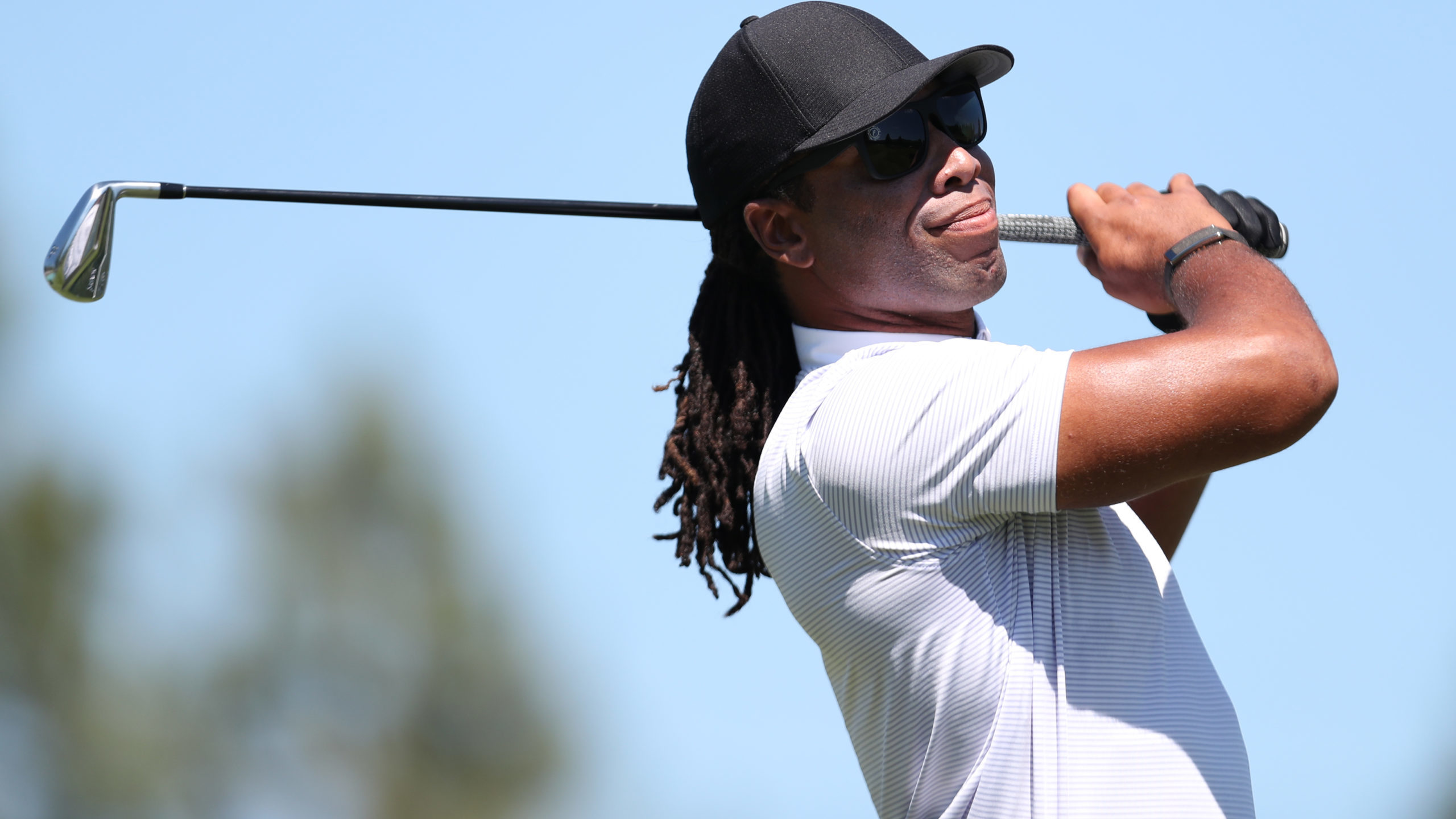 NFL athlete Larry Fitzgerald tees off on the first hole during round one of the American Century Ch...