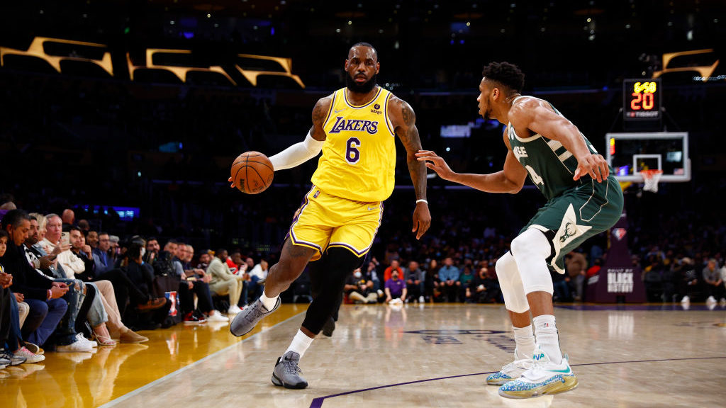 LeBron James #6 of the Los Angeles Lakers and Giannis Antetokounmpo #34 of the Milwaukee Bucks at C...