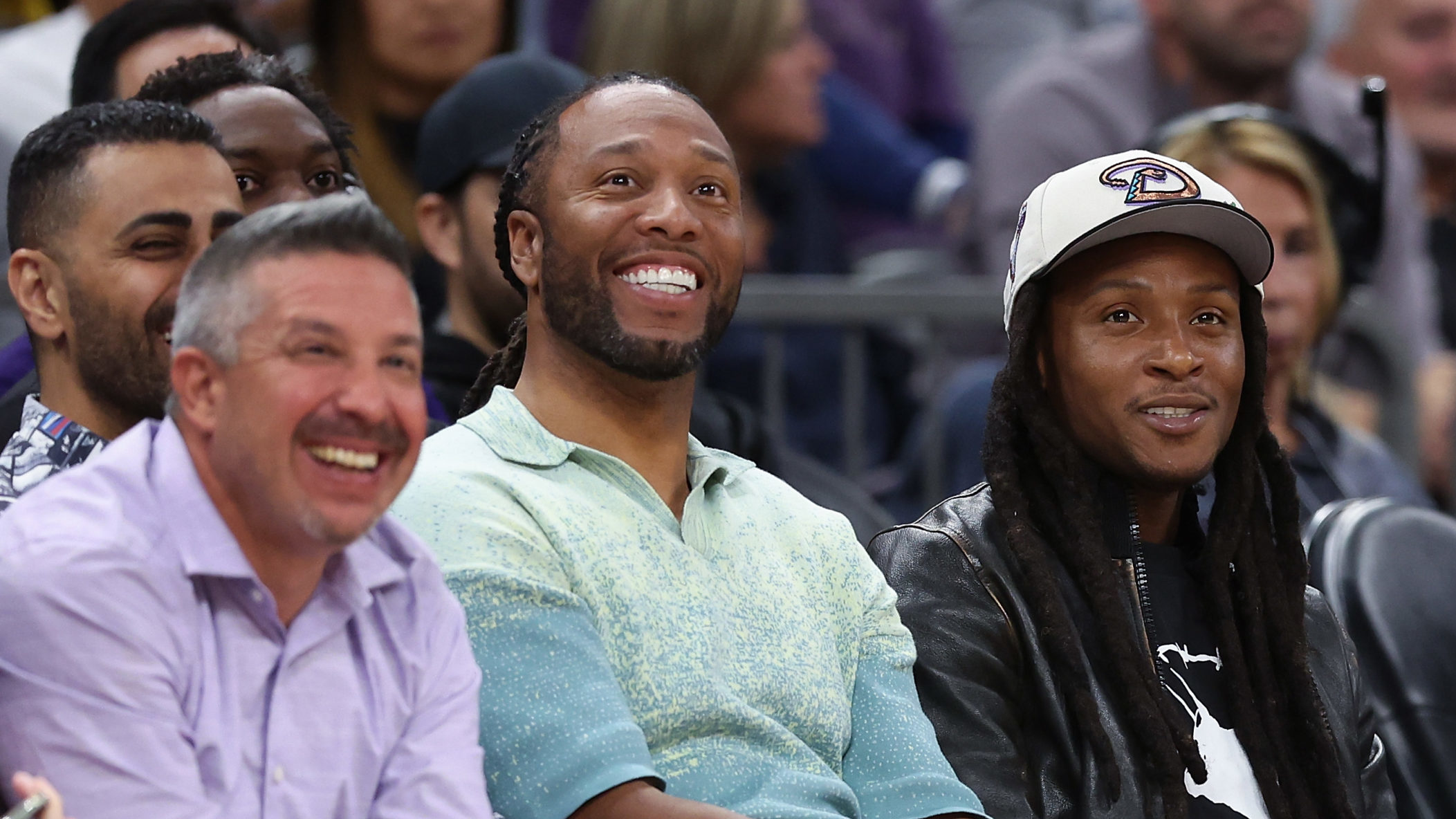 Phoenix Suns owner Larry Fitzgerald and Arizona Cardinals receiver DeAndre Hopkins attend the NBA g...