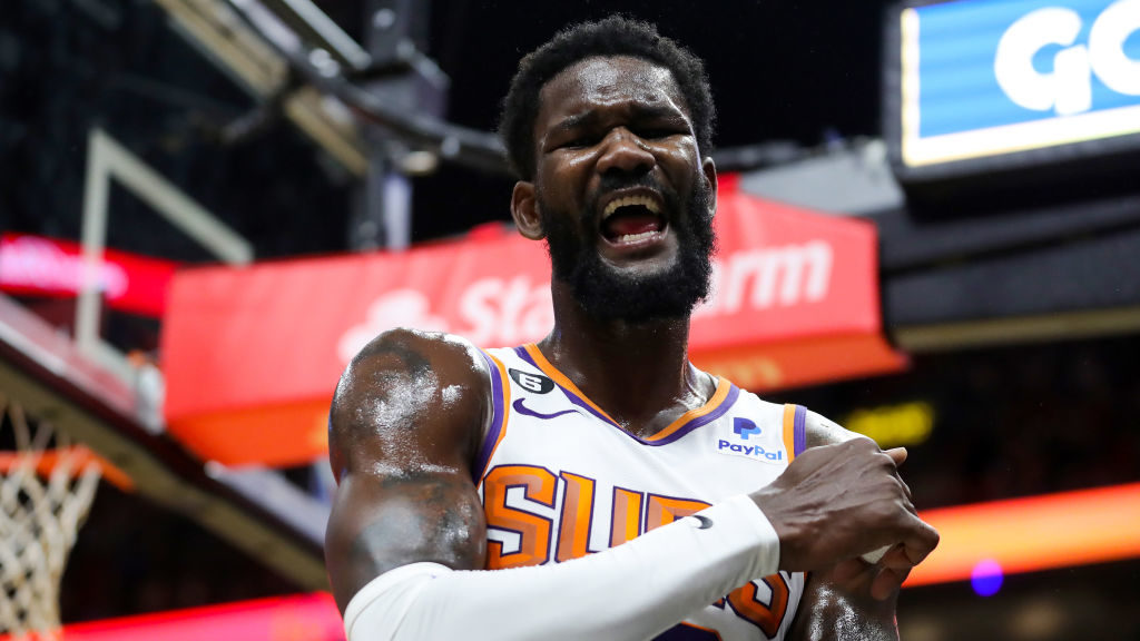 Deandre Ayton #22 of the Phoenix Suns reacts after being called for a foul against the Miami Heat d...