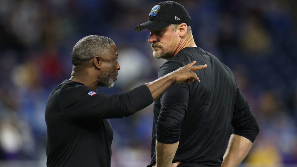 Defensive coordinator Aaron Glenn of the Detroit Lions and head coach Dan Campbell look on prior to...