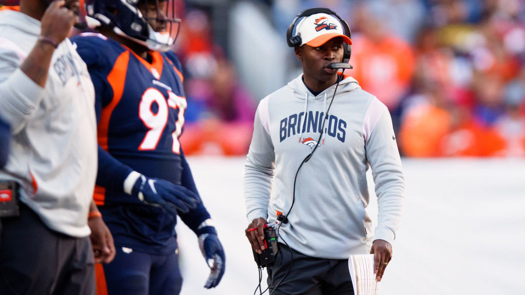 Defensive Coordinator Ejiro Evero of the Denver Broncos calls in a play against the Kansas City Chi...