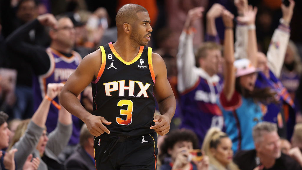 Chris Paul #3 of the Phoenix Suns reacts to a three-point shot against the New Orleans Pelicans dur...