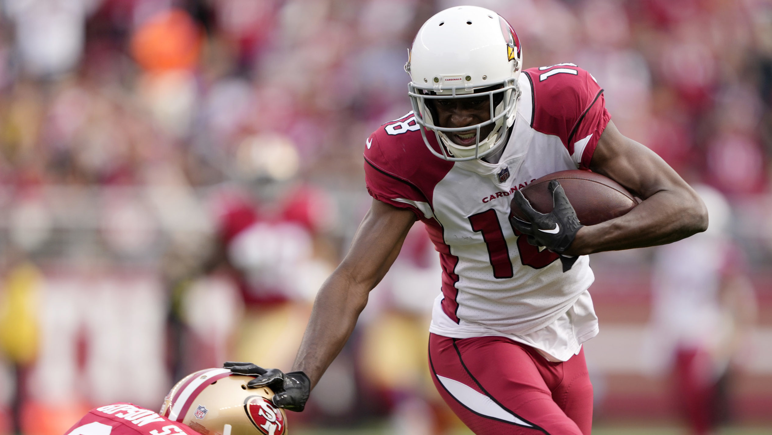 A.J. Green #18 of the Arizona Cardinals runs for a touchdown during the first quarter against the S...